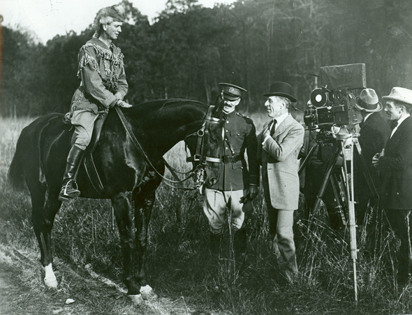 Image of Major Jonathan M. Wainright, Colonel J. Hamilton Hawkins, and D. W. Griffith on set of cavalry charge scene for America (1924). Ft. Myer, Virginia, November 1, 1923.